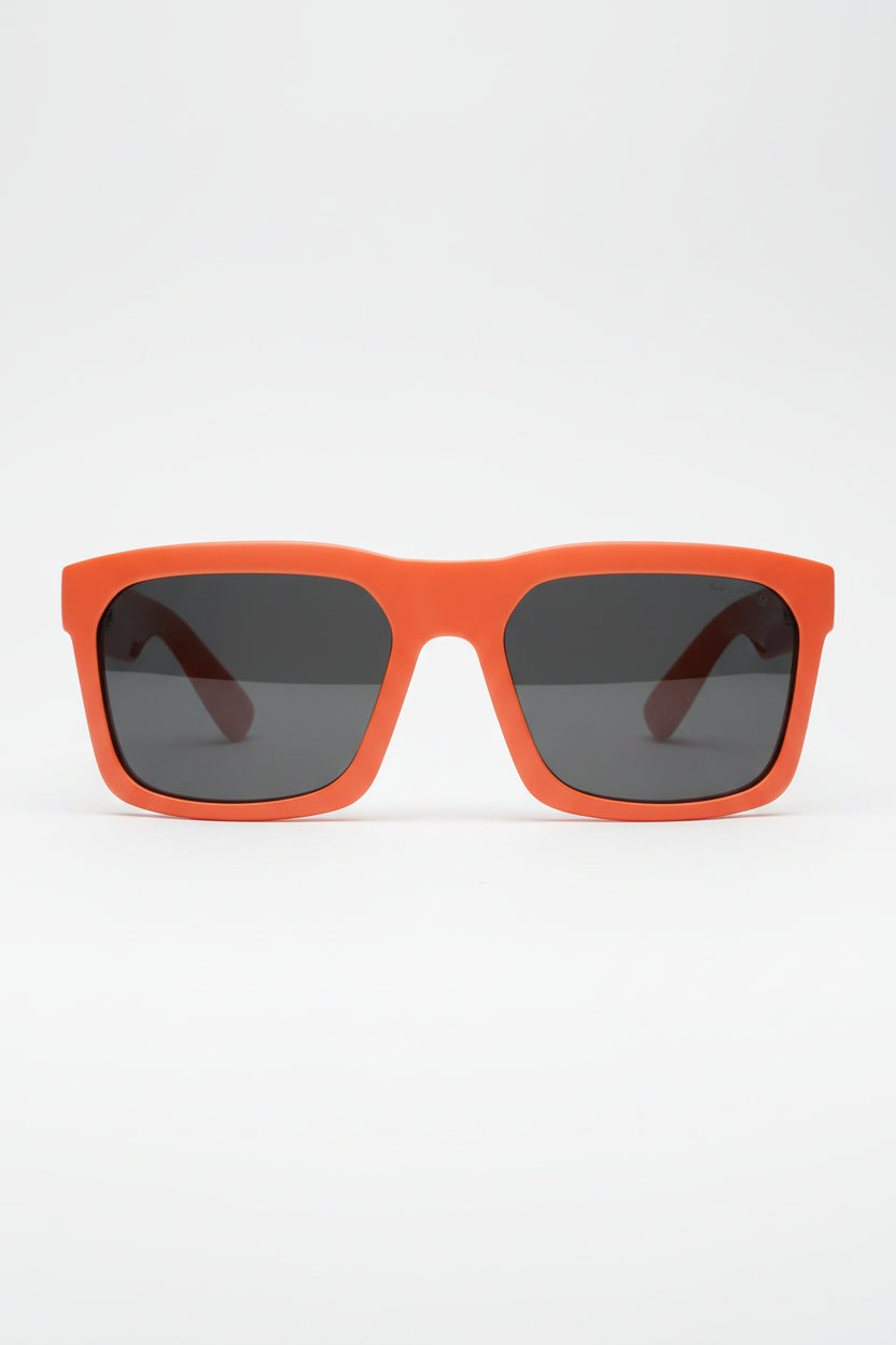 IVI GIVING Sunglasses in Polished Blood Orange and Brushed Gunmetal | Grey Lens