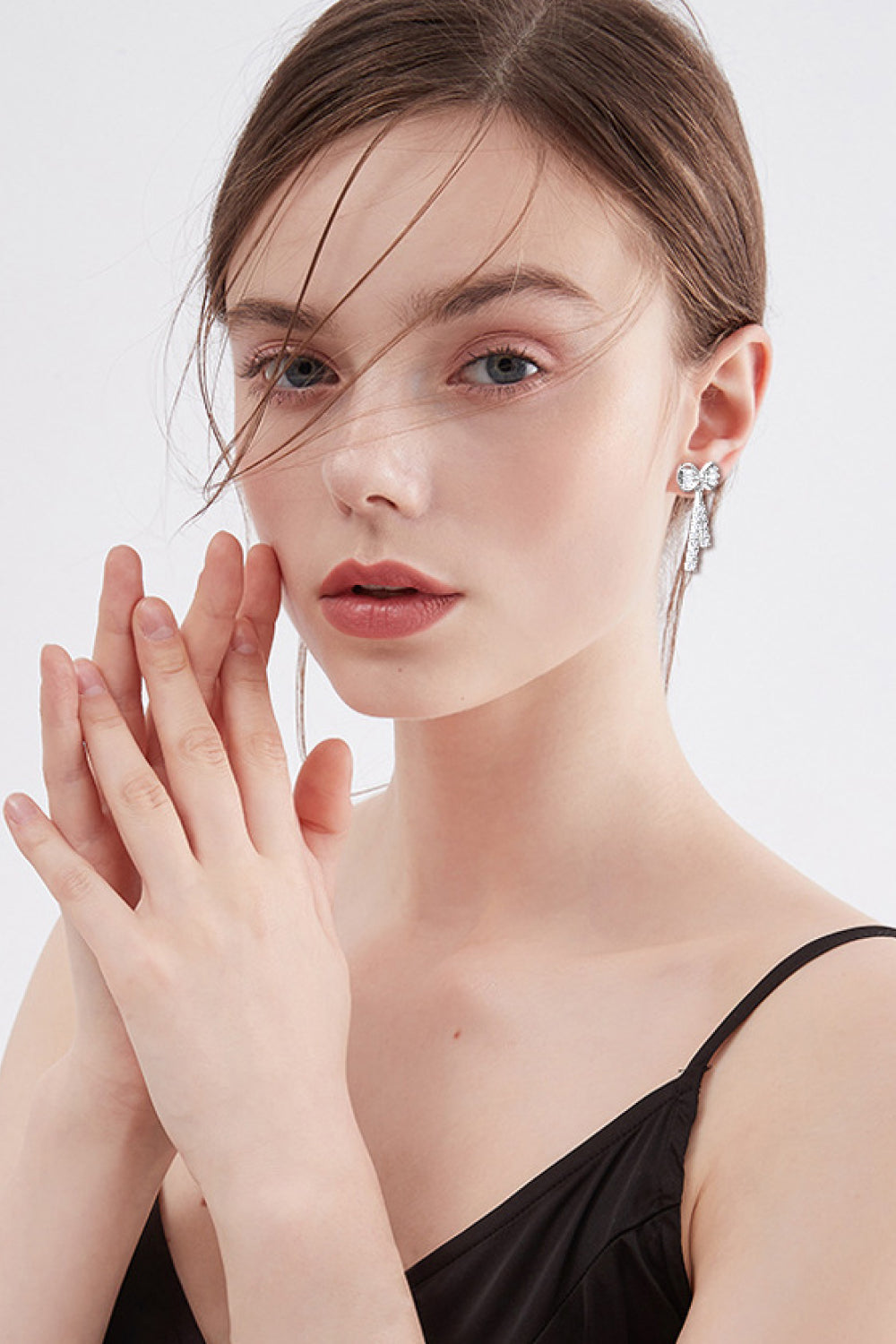 Bow Tie Moissanite Silver Earrings