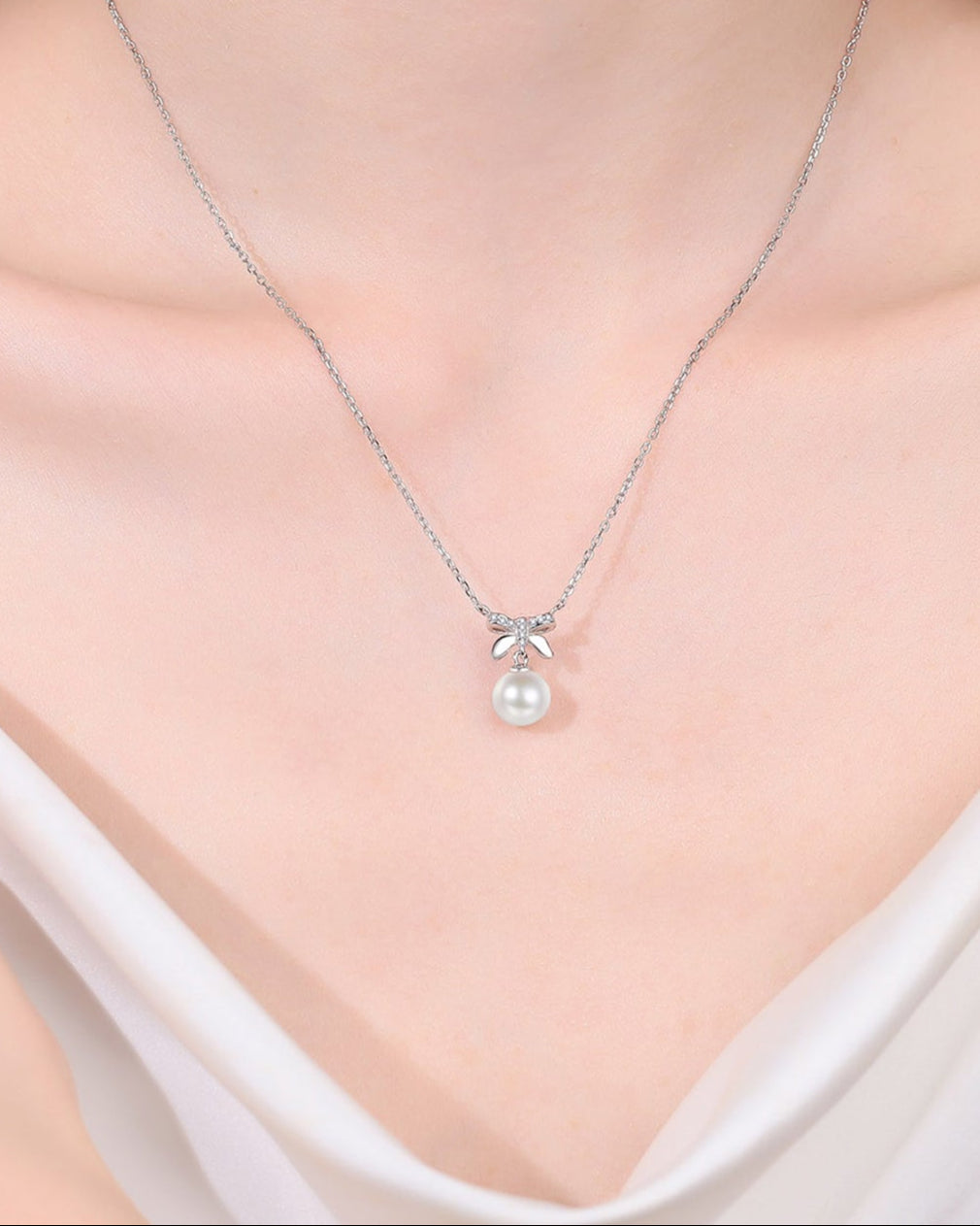 Pearl Bow Pendant Necklace