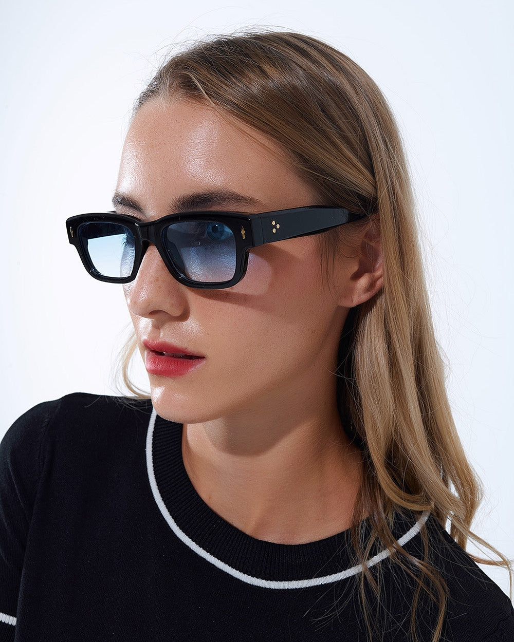 Black Sunglasses with Oval Frame Gold Detail and Blue Glass