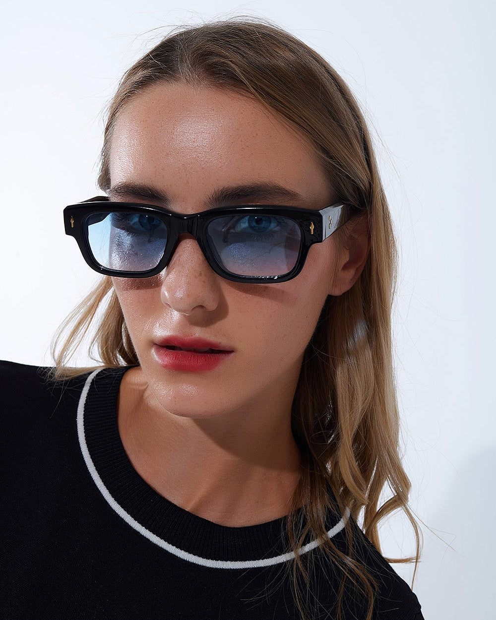 Black Sunglasses with Oval Frame Gold Detail and Blue Glass