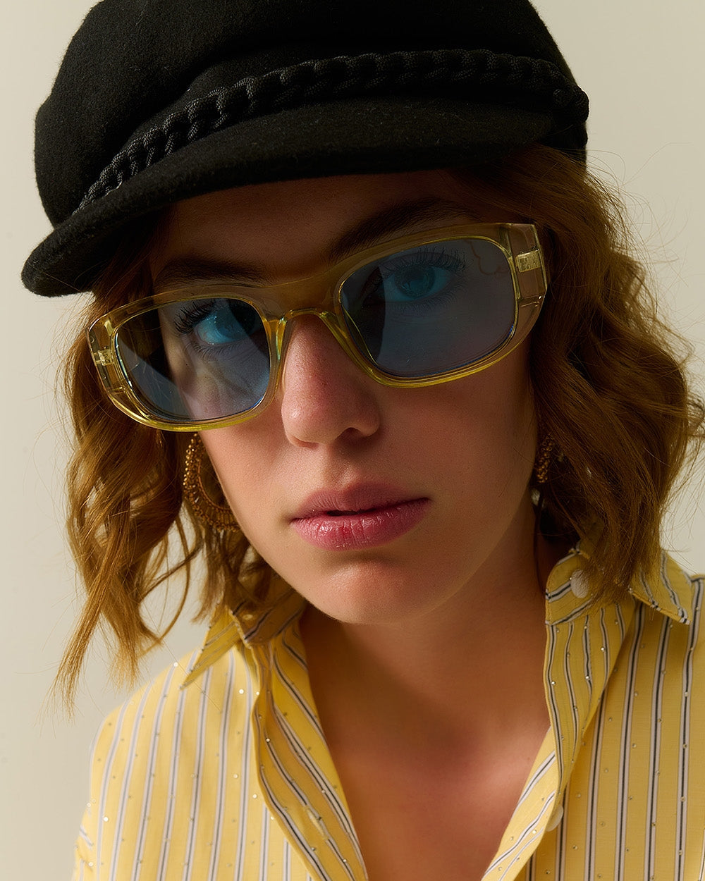 Oval Sunglasses with High Gloss Transparent Frames in Yellow