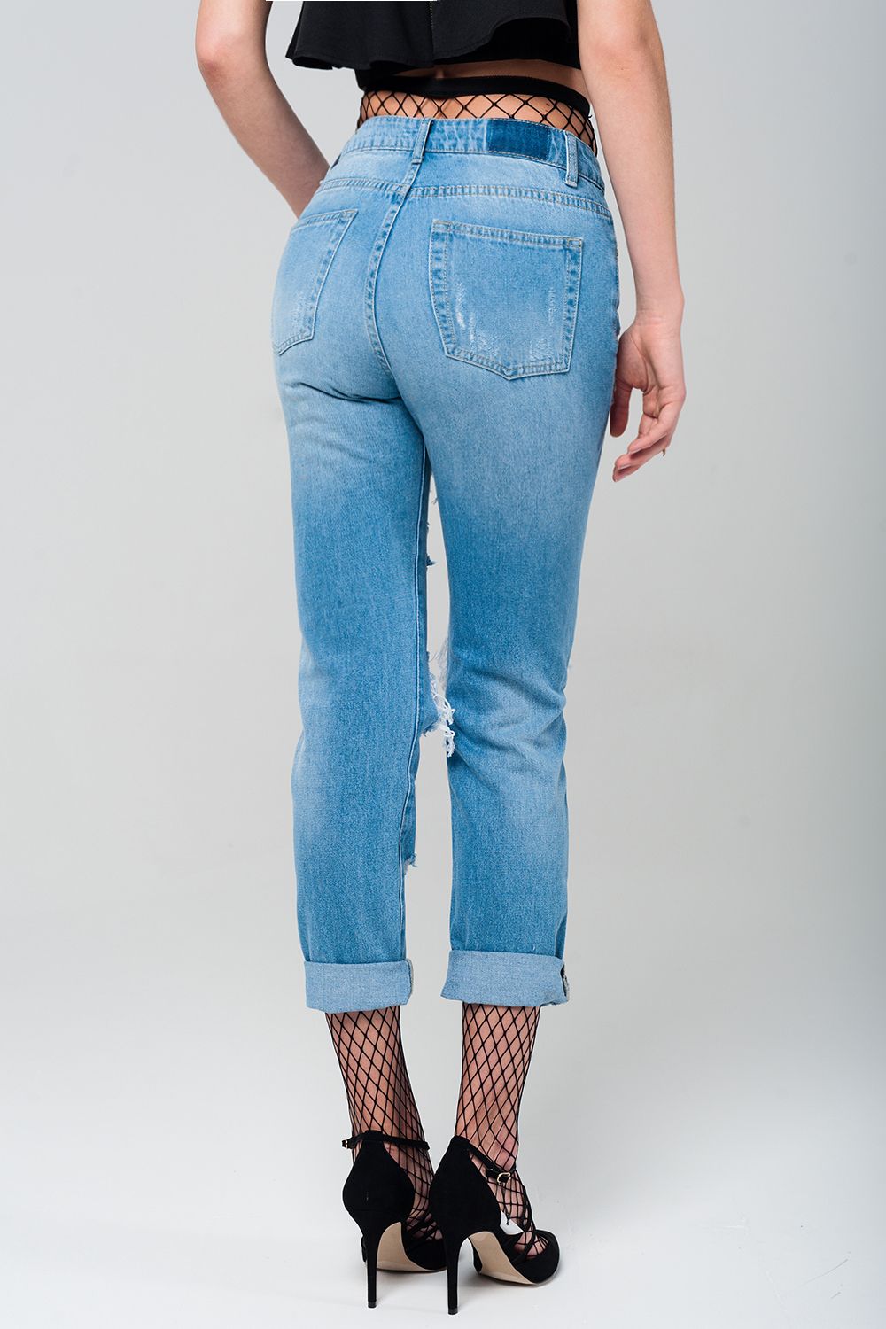 Ripped Mom Jeans with Fishnet Tights