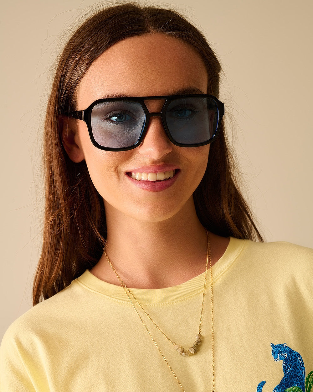 Sunglasses with Black Frames and Blue Lenses