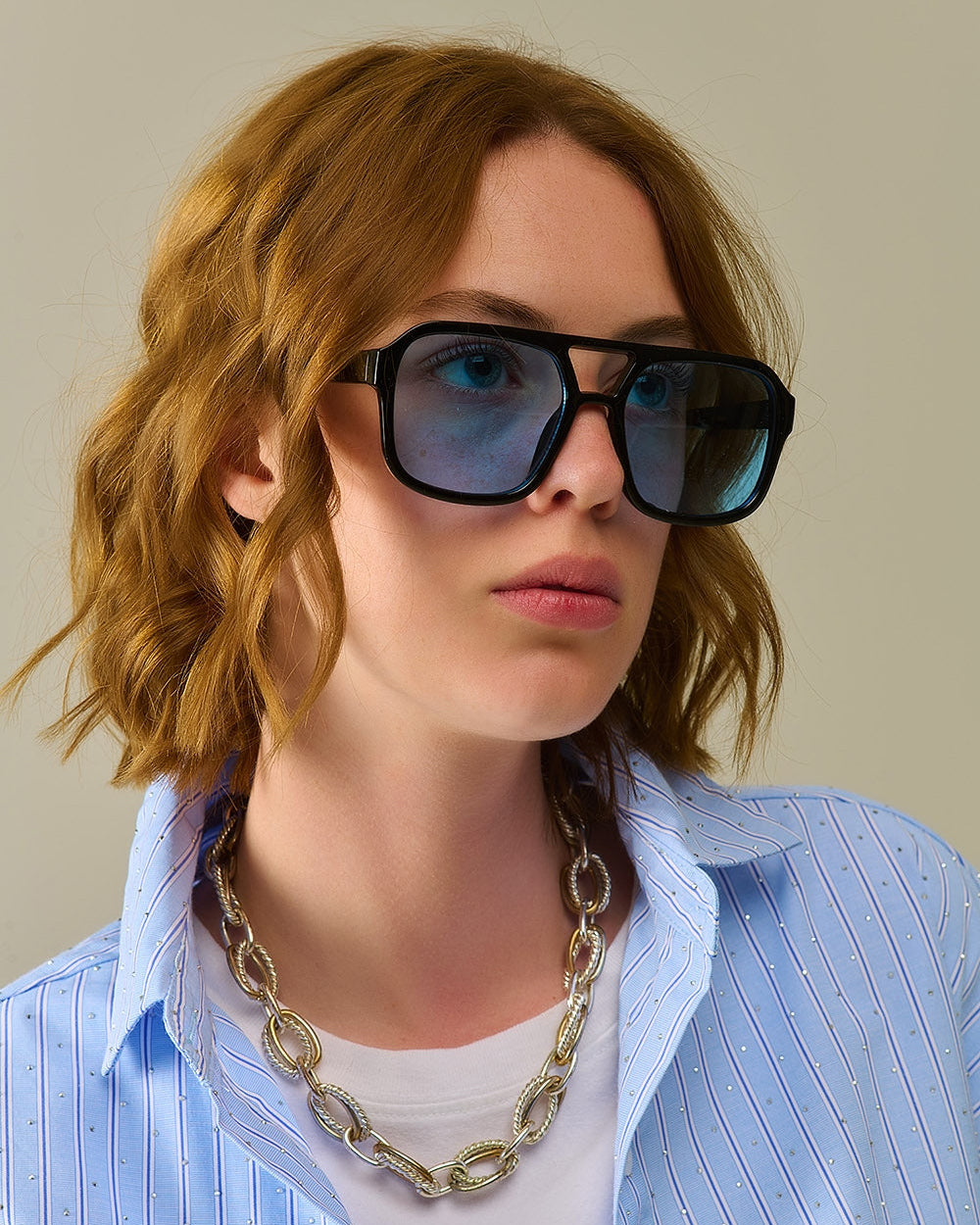 Sunglasses with Black Frames and Blue Lenses