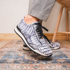 Alonzo Sneaker | Newspaper