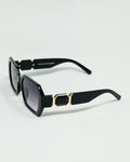 Black Diamond-Shaped Sunglasses and Goldden Detail