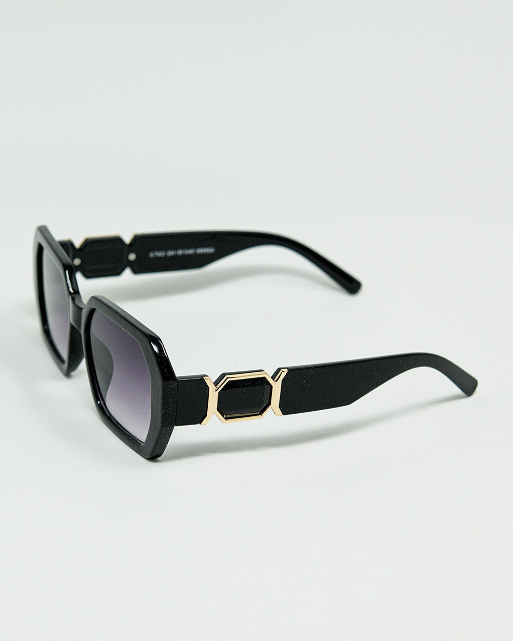 Black Diamond-Shaped Sunglasses and Goldden Detail