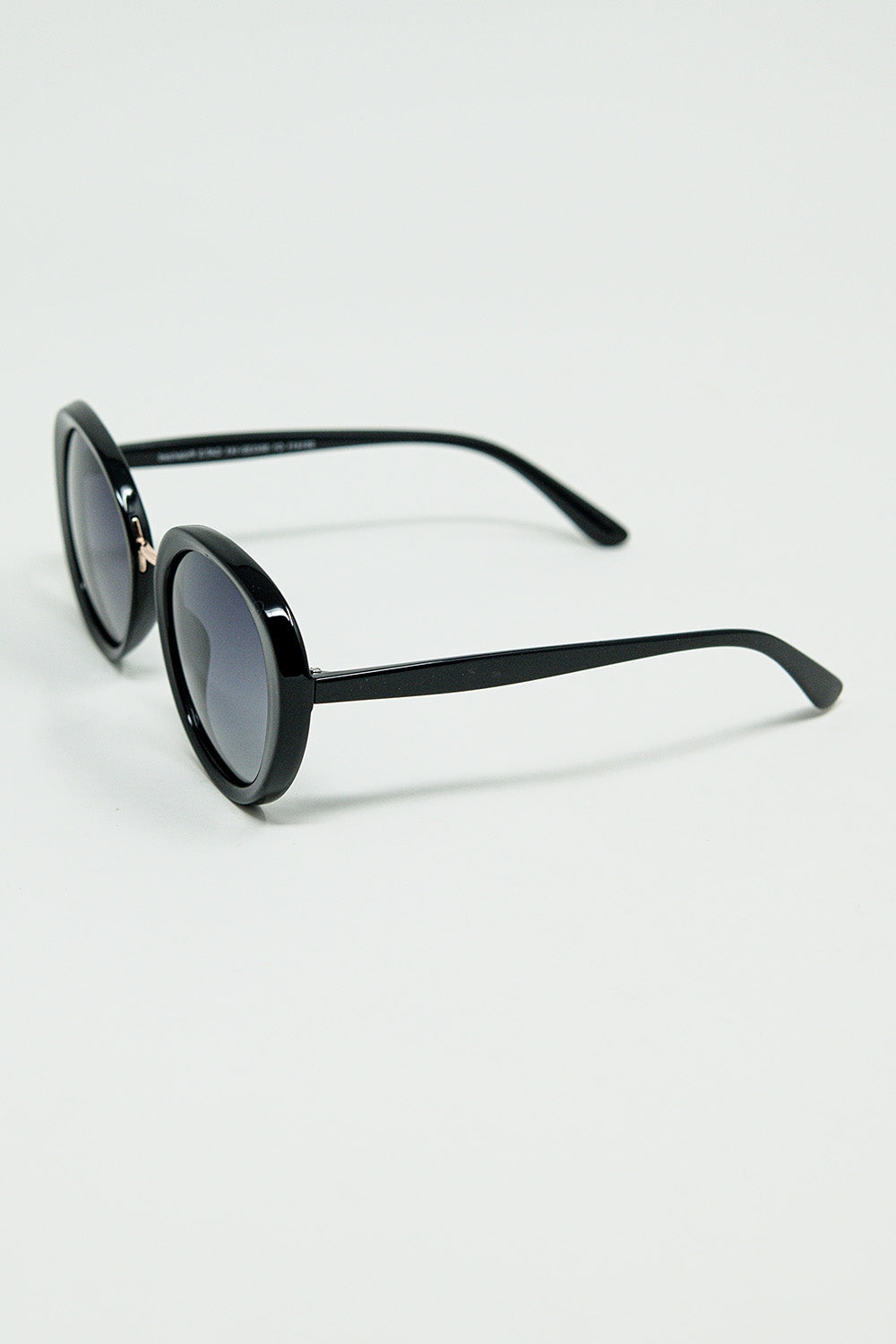 Black Oval Shaped Sunglasses with Metal Gold Detail