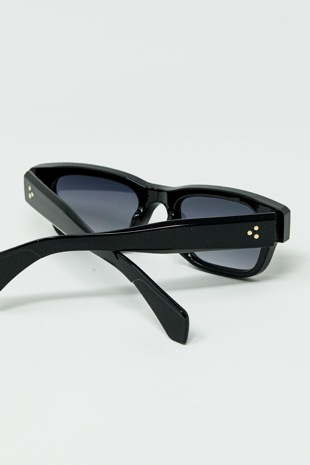Black Sunglasses with Oval Frame and Gold Detail