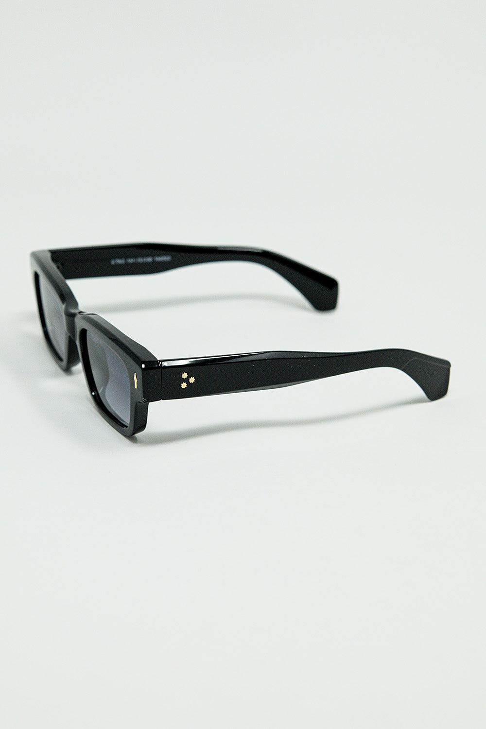 Black Sunglasses with Oval Frame and Gold Detail
