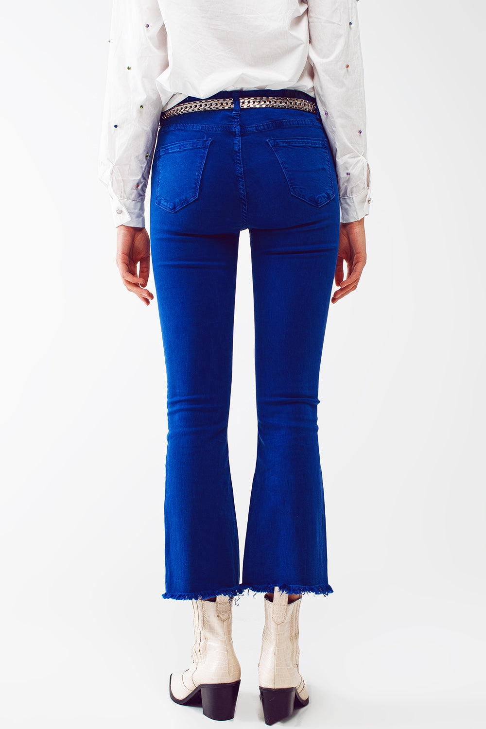 Flare Jeans with Raw Hem Edge in Blue