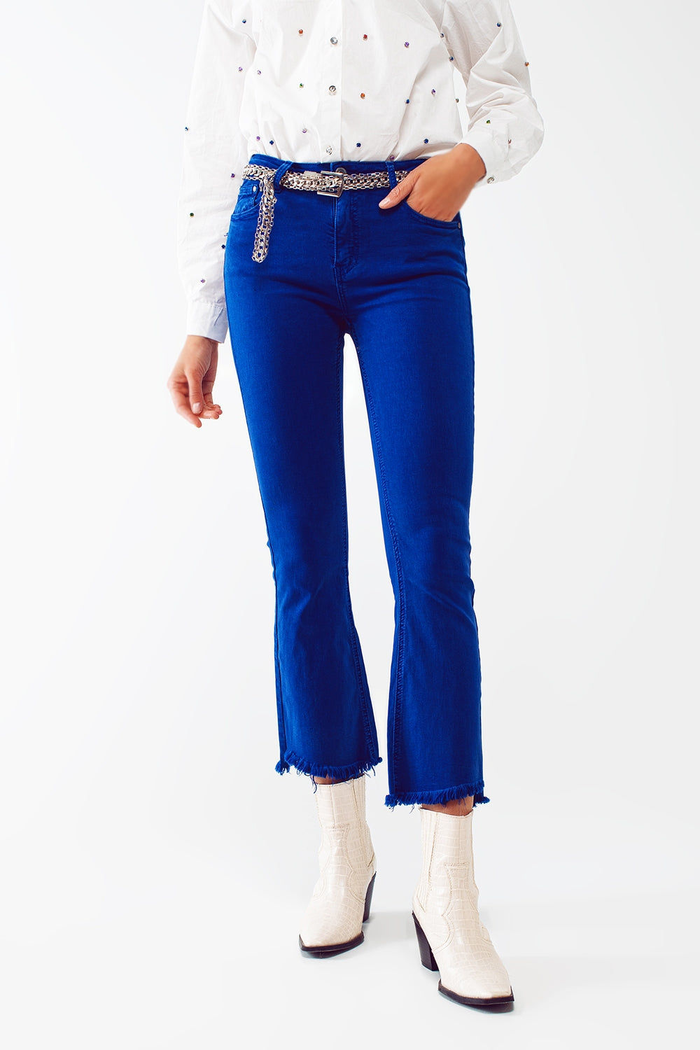 Flare Jeans with Raw Hem Edge in Blue