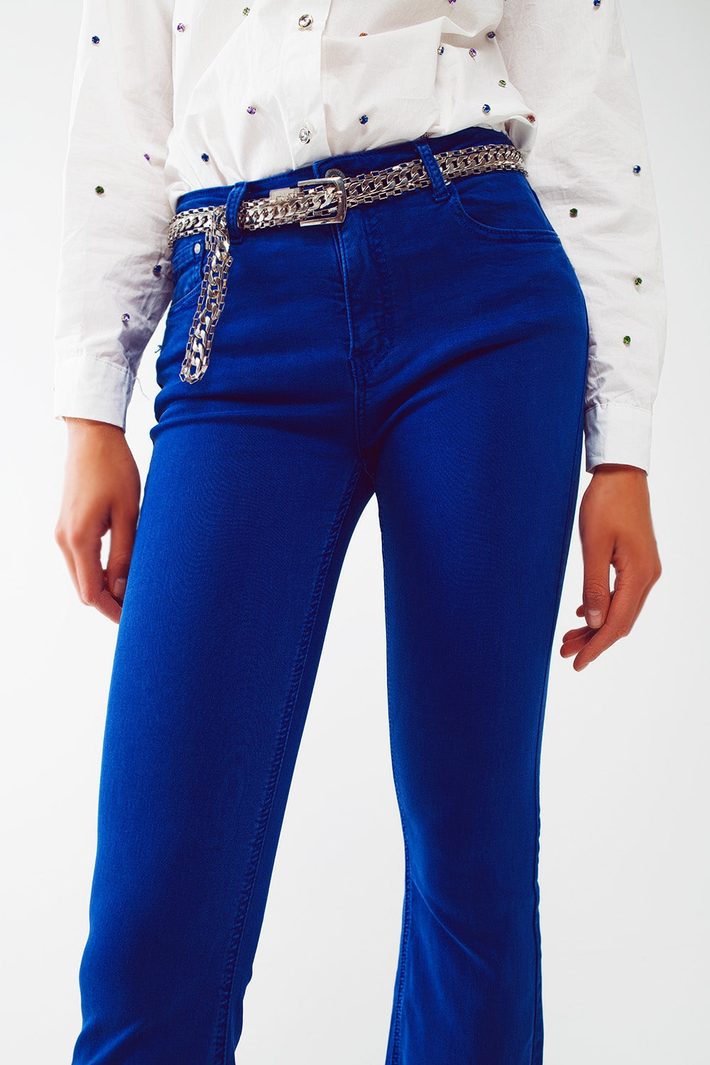 Flare Jeans with Raw Hem Edge in Blue
