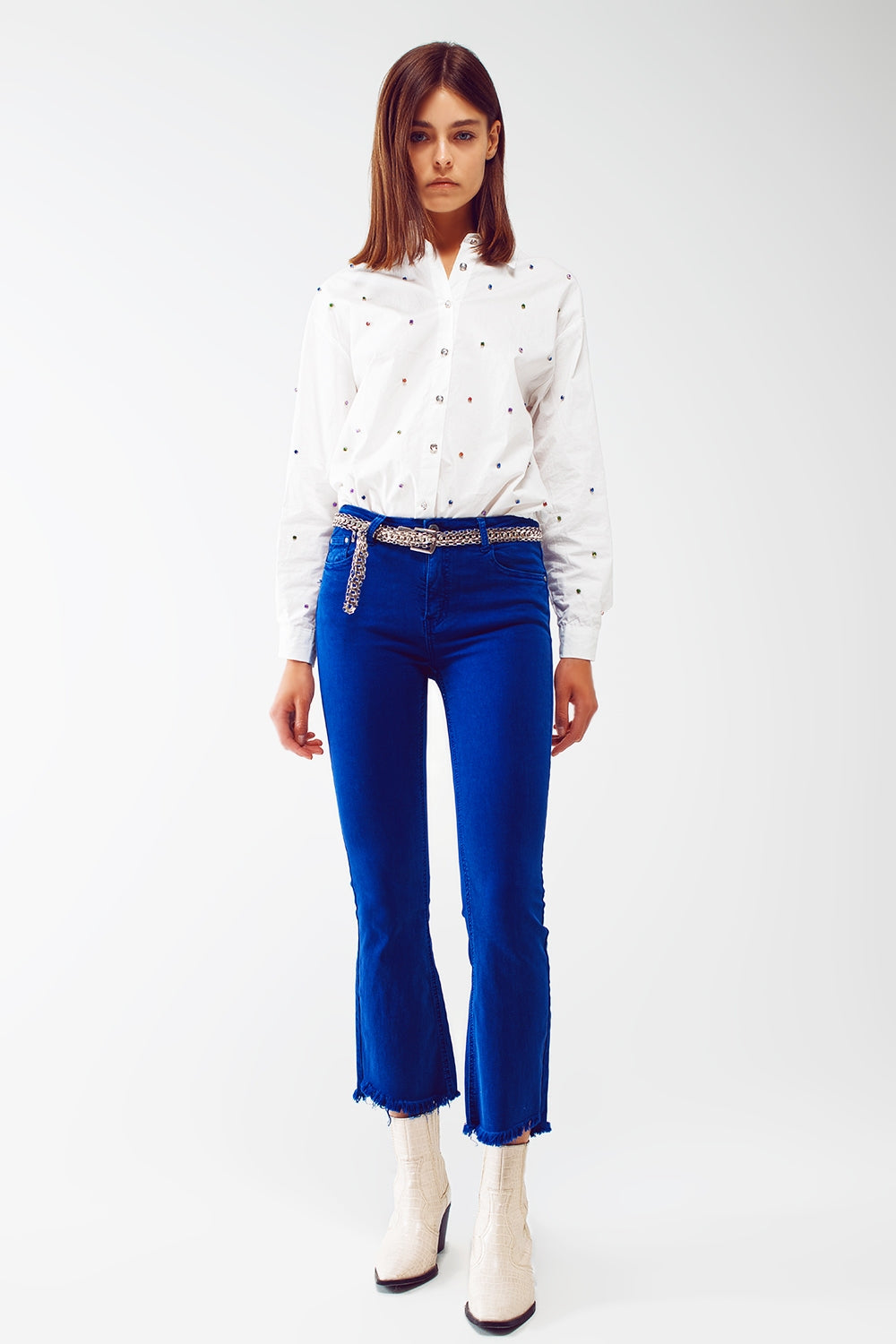 Flare Jeans with Raw Hem Edge in Blue