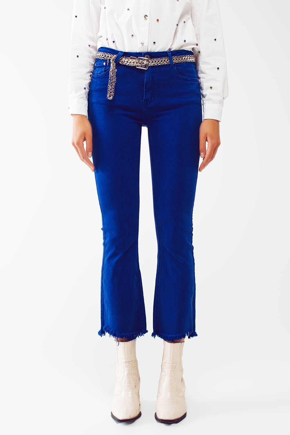 Flare Jeans with Raw Hem Edge in Blue