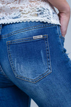 Jean with Shredded Rips and Raw-Cut Cuffs