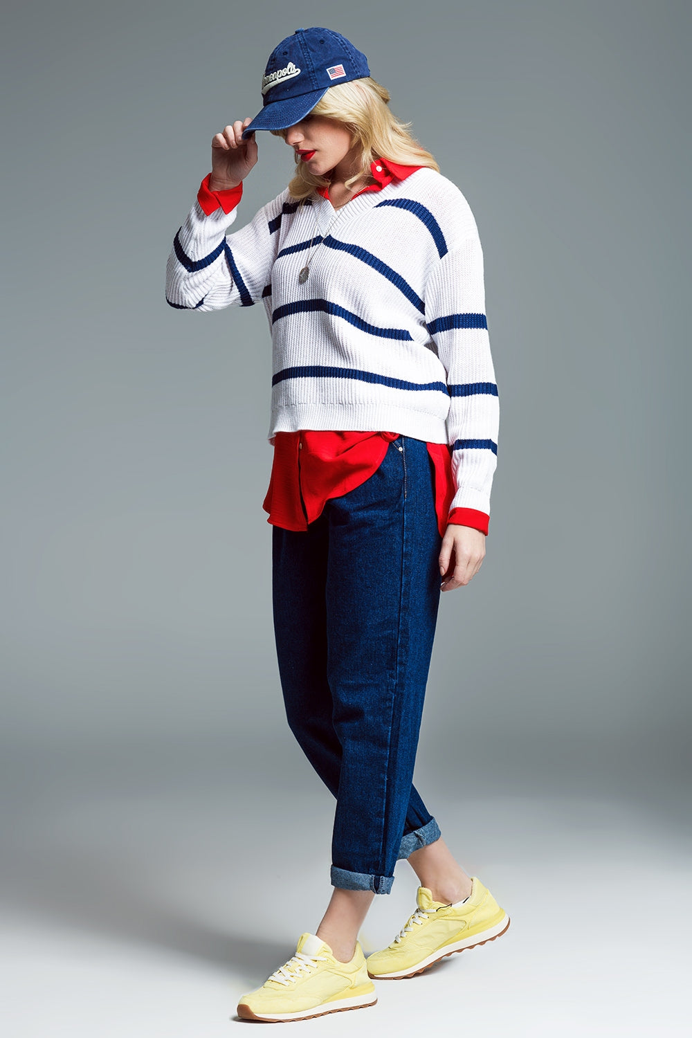 Ribbed White Sweater with Black Stripes and V-Neckline
