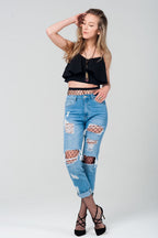 Ripped Mom Jeans with Fishnet Tights