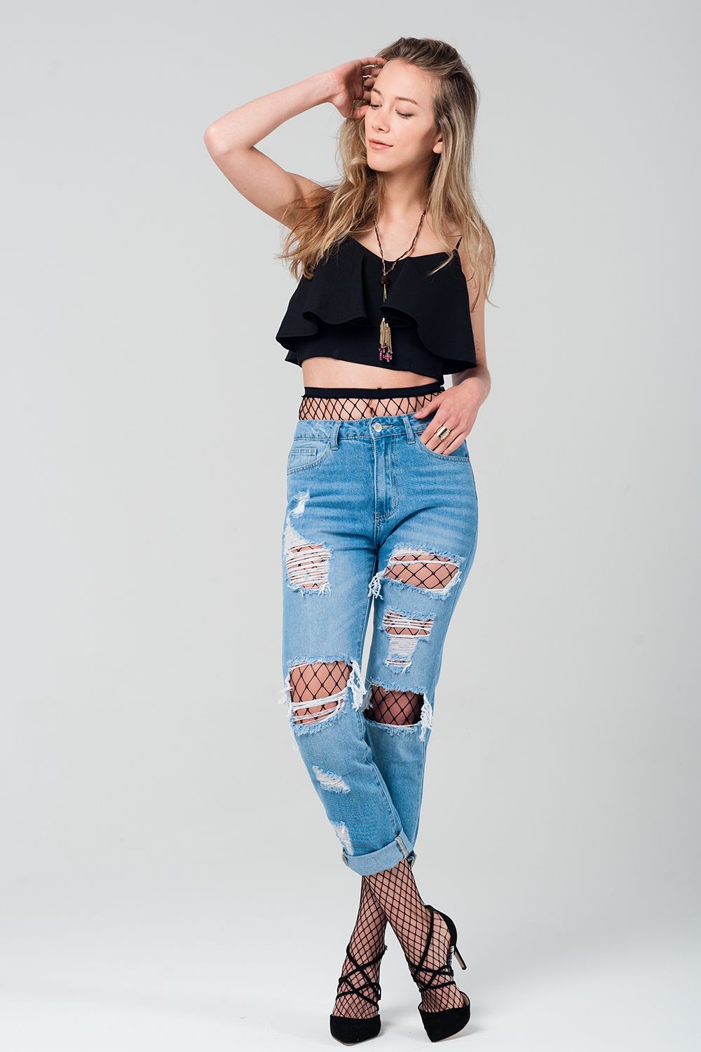 Ripped Mom Jeans with Fishnet Tights
