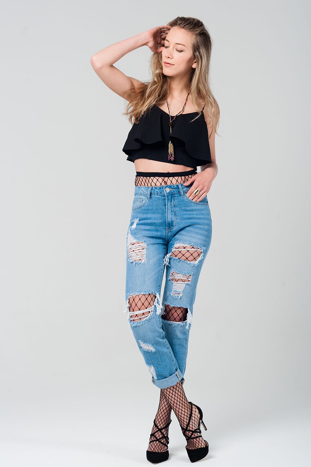 Ripped Mom Jeans with Fishnet Tights