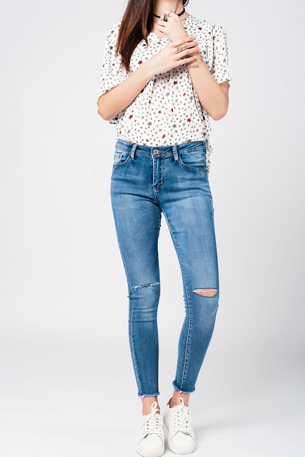 Skinny Jeans in Midwash with Busted Knees and Chewed Hems
