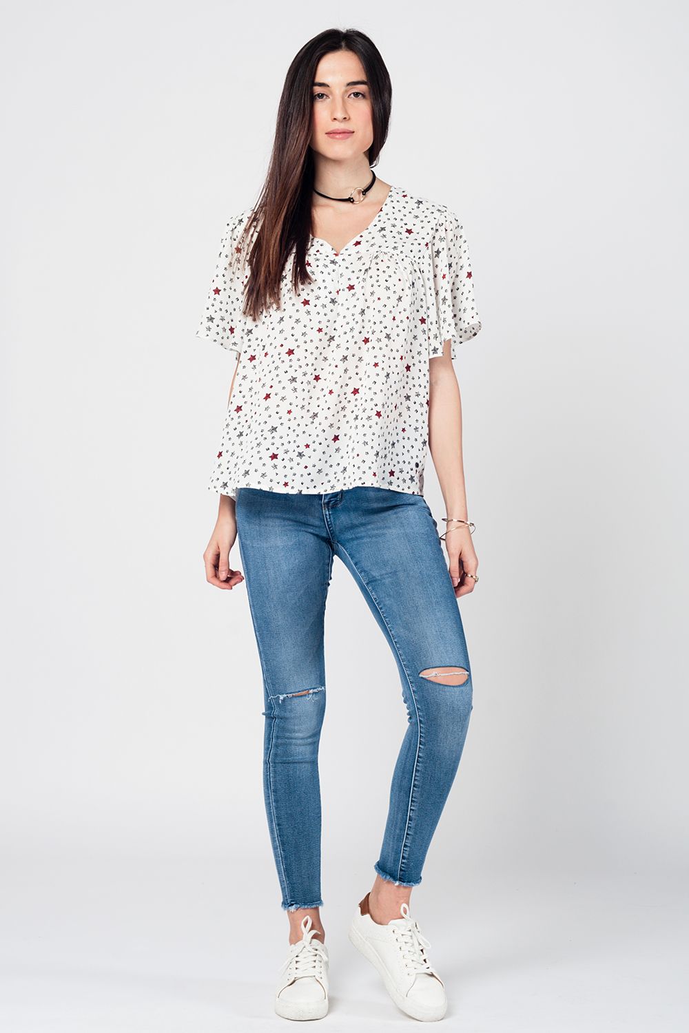 Skinny Jeans in Midwash with Busted Knees and Chewed Hems