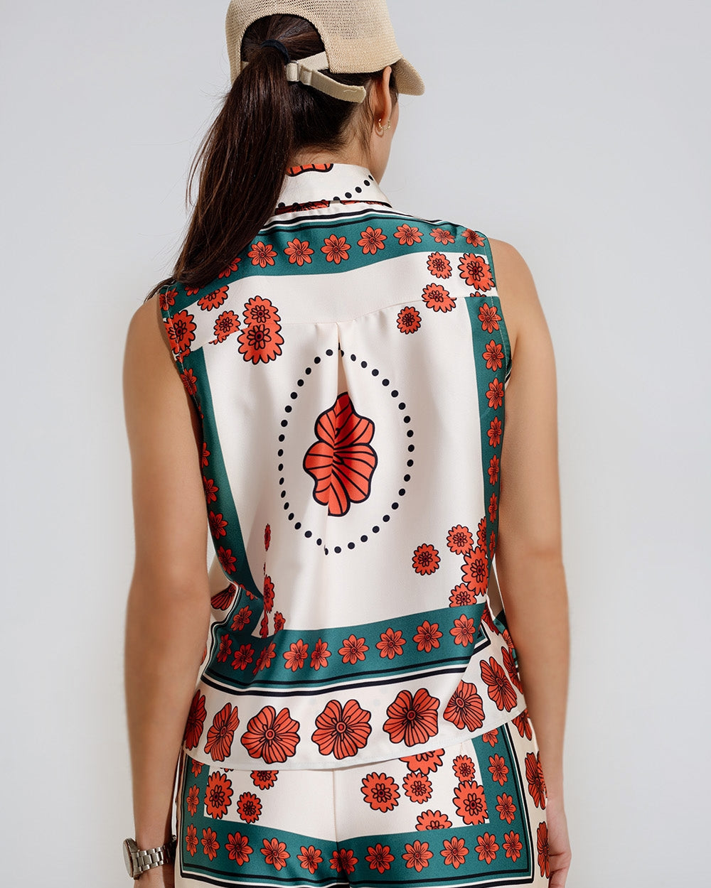 Sleeveless Creme Shirt with Floral Design